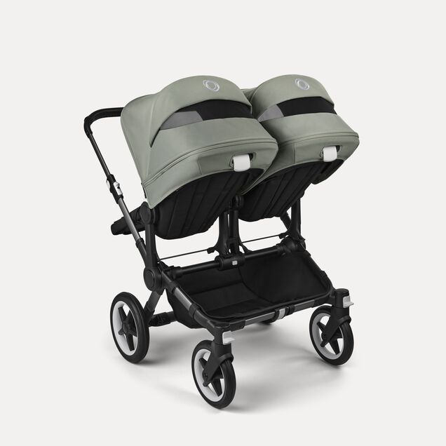 Bugaboo Donkey 5 twin stroller graphite base, midnight black fabrics, forest green sun canopy - Main Image Slide 4 of 12