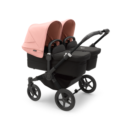 Bugaboo Donkey 5 Twin bassinet and seat stroller black base, midnight black fabrics, morning pink sun canopy - view 1