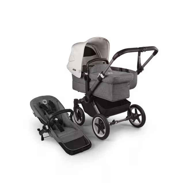 Refurbished Bugaboo Donkey 5 Mono bassinet and seat stroller graphite base, grey mélange fabrics, misty white sun canopy - Main Image Slide 1 of 11
