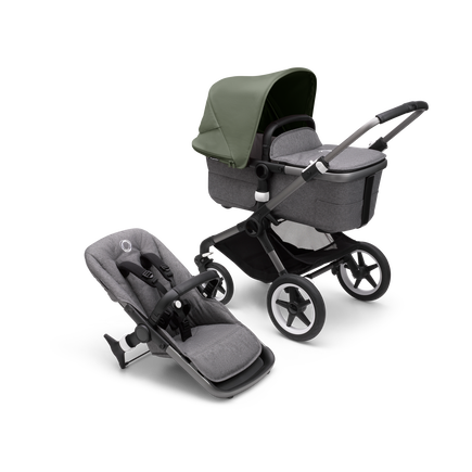 Bugaboo Fox 3 bassinet and seat stroller with graphite frame, grey melange fabrics, and forest green sun canopy.