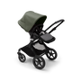 Bugaboo Fox 3 seat stroller with black frame, black fabrics, and forest green sun canopy. - Thumbnail Slide 6 of 7