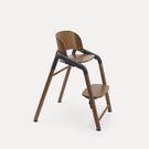 Bugaboo Giraffe chair in warm wood/grey.
