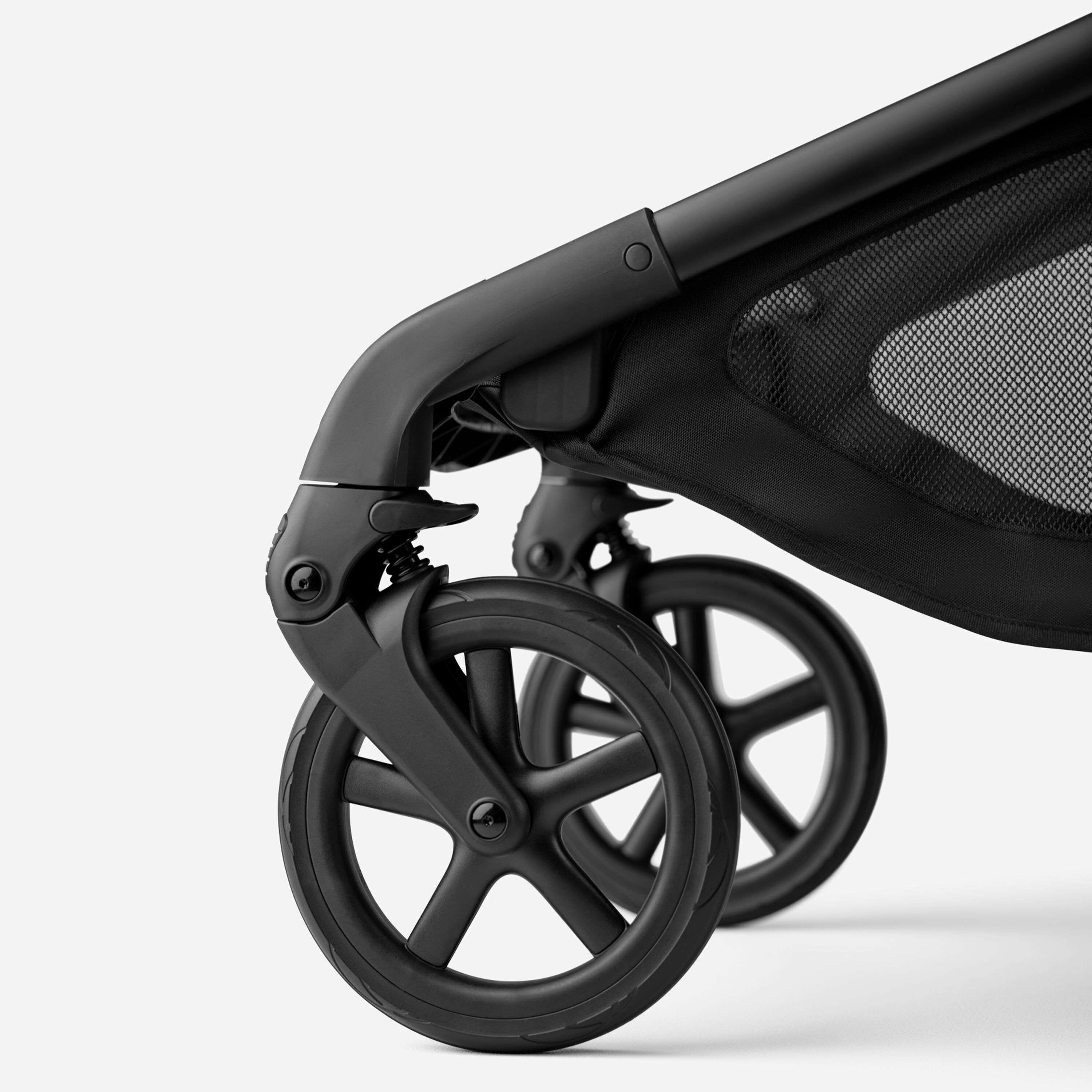 A close-up of the front wheels of the Bugaboo Kangaroo 2-in-1 stroller. - Main Modal Image Slide 9 of 18