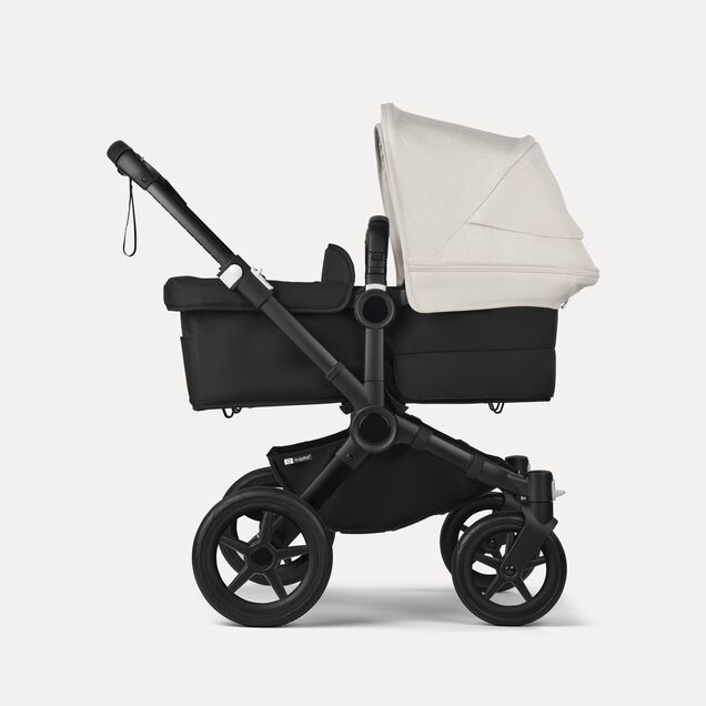 Bugaboo Donkey 5 twin stroller black base, midnight black fabrics, misty white sun canopy - Main Image Slide 2 of 12