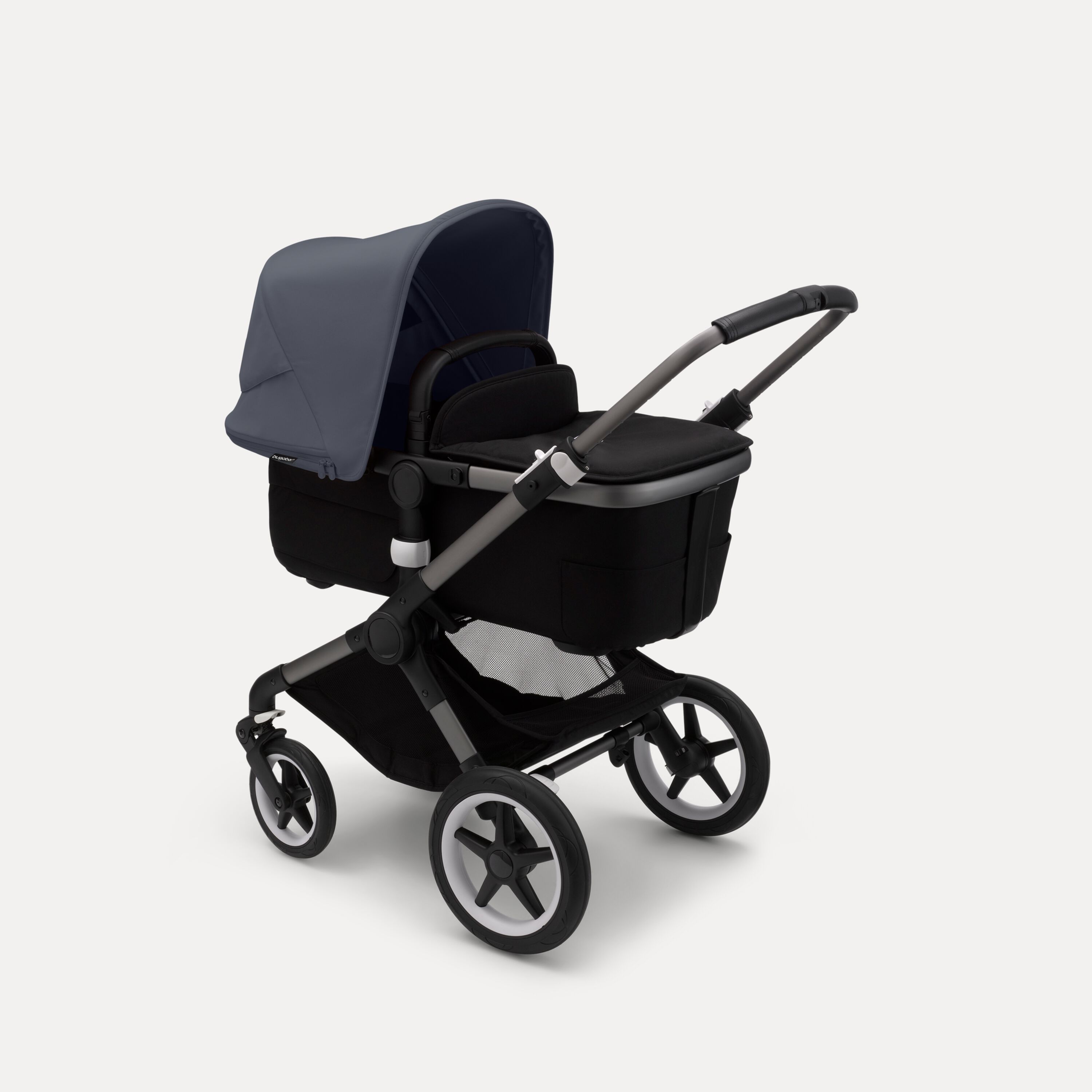 Bugaboo Fox 3 bassinet stroller with black frame, grey fabrics, and stormy blue sun canopy. - Main Modal Image Slide 2 of 7