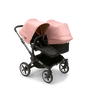 Bugaboo Donkey 5 Duo bassinet and seat stroller graphite base, midnight black fabrics, morning pink sun canopy - Thumbnail Slide 1 of 12