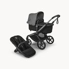 Bugaboo Fox 5 Renew bassinet and seat 2-in-1 stroller, with graphite chassis, Heritage Black fabrics, and Moon Grey sun canopy.