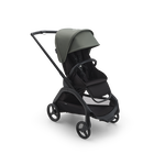 Bugaboo Dragonfly seat stroller with black chassis, midnight black fabrics and forest green sun canopy.