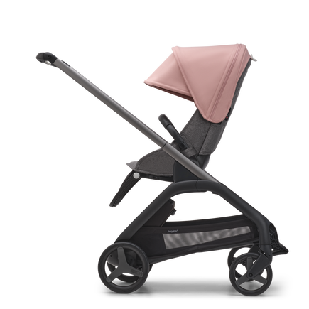 Side view of the Bugaboo Dragonfly seat stroller with graphite chassis, grey melange fabrics and morning pink sun canopy. - view 2