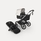 Bugaboo Fox 5 Renew bassinet and seat 2-in-1 stroller, with graphite chassis, Heritage Black fabrics, and Misty White sun canopy.