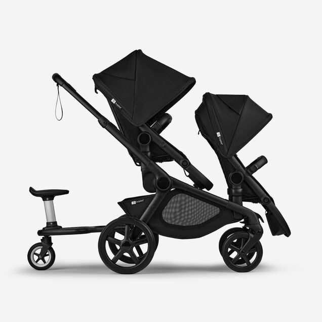 Bugaboo Kangaroo 2-in-1 tandem stroller with two seats and a wheeled board, with Midnight Black fabrics and Midnight Black sun canopies. - Main Image Slide 7 of 18