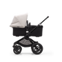 Side view of a Bugaboo Fox 3 pram body stroller with black frame, black fabrics, and white sun canopy. - Thumbnail Slide 9 of 9
