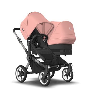 Bugaboo Donkey 5 Duo double stroller graphite base, midnight black fabrics, morning pink sun canopy