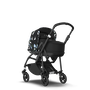 Bugaboo Bee 6 bassinet and seat stroller black base, black fabrics, animal explorer green/ light blue sun canopy