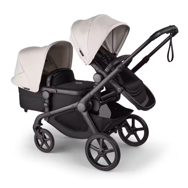 Bugaboo Kangaroo 2-in-1 tandem stroller with one seat above and one bassinet below, with Midnight Black fabrics and Misty White sun canopies. - Main Image Slide 3 of 18