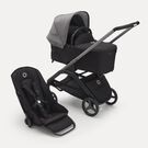 Poussette siège et nacelle Bugaboo Dragonfly avec châssis graphite, habillages nuit noire et capote gris chiné.