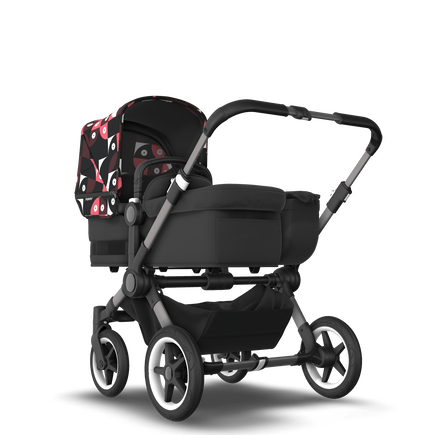 Bugaboo Donkey 5 Mono bassinet and seat stroller graphite base, midnight black fabrics, animal explorer pink/ red sun canopy