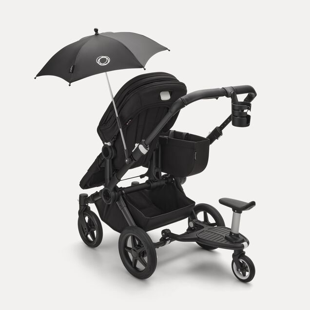Refurbished Bugaboo Donkey 5 Mono bassinet and seat stroller black base, midnight black fabrics, sunrise red sun canopy - Main Image Slide 9 of 10
