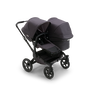 Bugaboo Donkey 5 Duo seat and bassinet stroller with black chassis, mineral washed black fabrics and mineral washed black sun canopy.