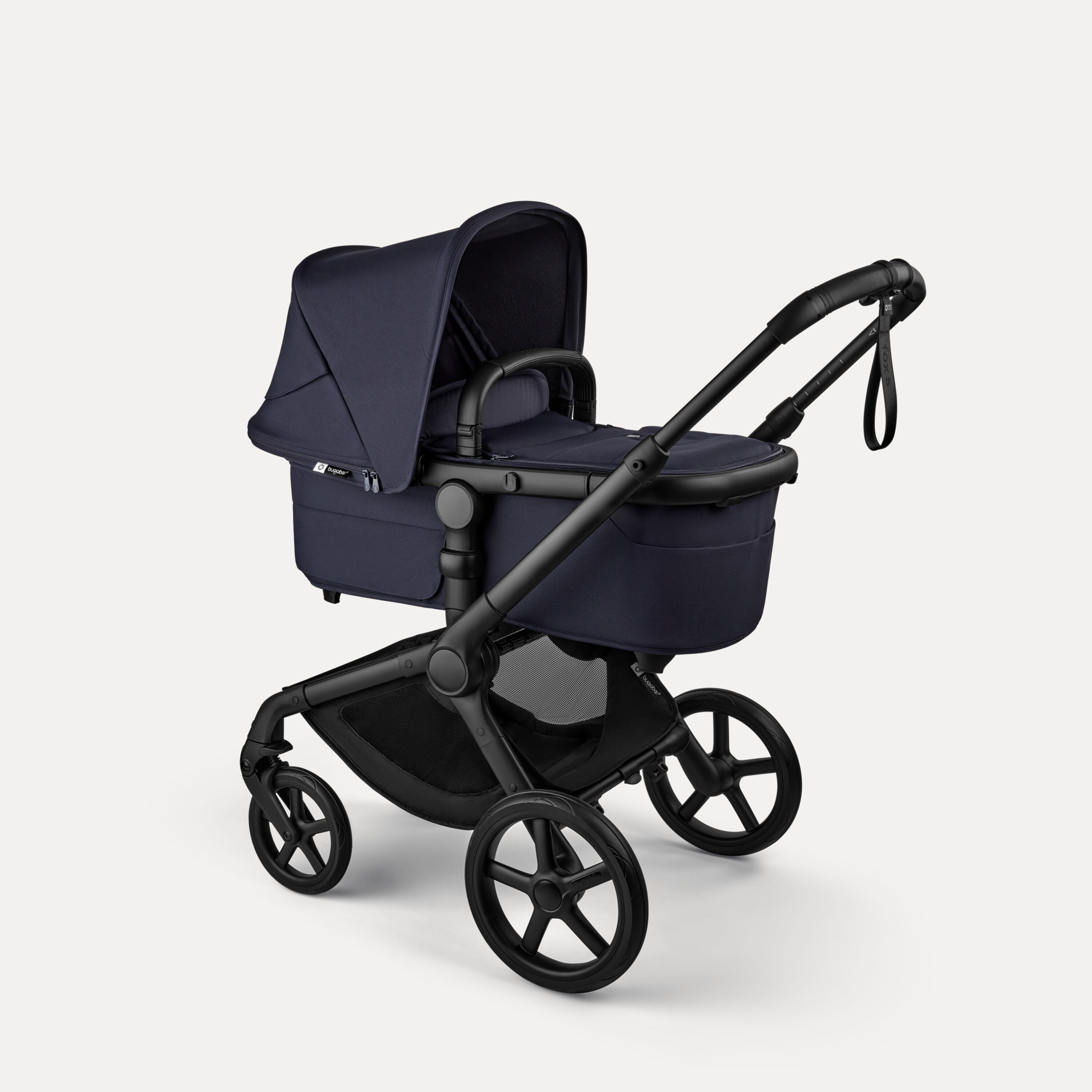 Bugaboo Fox 5 Renew bassinet newborn stroller, with black chassis, Deep Indigo fabrics, and Deep Indigo sun canopy. - Main Modal Image Slide 2 of 12