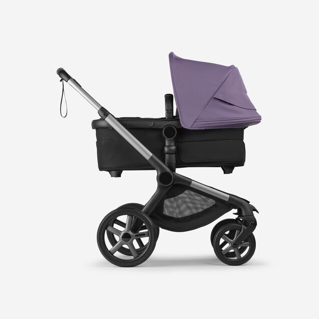 Bugaboo Fox 5 Renew bassinet newborn stroller, with graphite chassis, Heritage Black fabrics, and Astro Purple sun canopy. - Main Image Slide 2 of 12