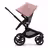 Side view of the Bugaboo Fox 5 seat stroller with black chassis, grey melange fabrics and morning pink sun canopy. - Thumbnail Slide 3 of 12