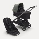Poussette siège et nacelle Bugaboo Dragonfly avec châssis graphite, habillages nuit noire et capote vert forêt.