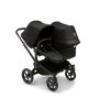 Bugaboo Donkey 5 Duo seat and bassinet stroller with black chassis, midnight black fabrics and midnight black sun canopy.