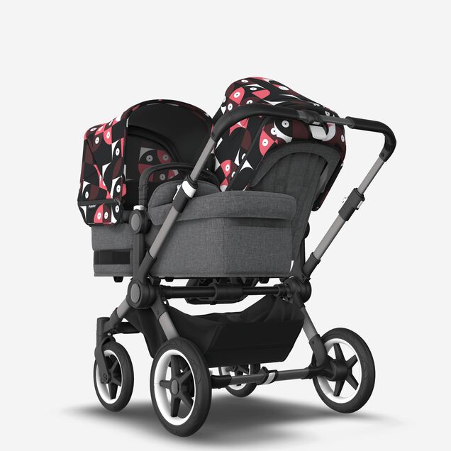 Bugaboo Donkey 5 Duo double stroller graphite base, grey mélange fabrics, animal explorer pink/ red sun canopy - Main Image Slide 1 of 10