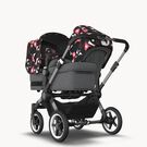 Bugaboo Donkey 5 Duo double stroller graphite base, grey mélange fabrics, animal explorer pink/ red sun canopy