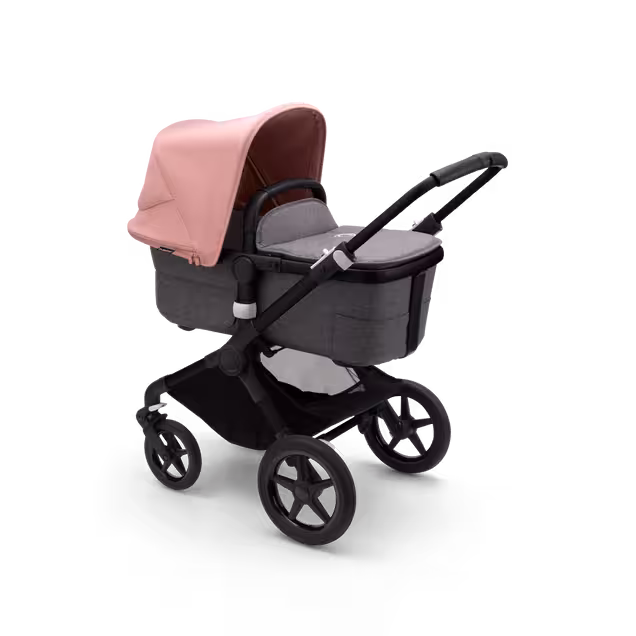 Bugaboo Fox 3 bassinet stroller with black frame, grey fabrics, and pink sun canopy. - Main Image Slide 2 of 7