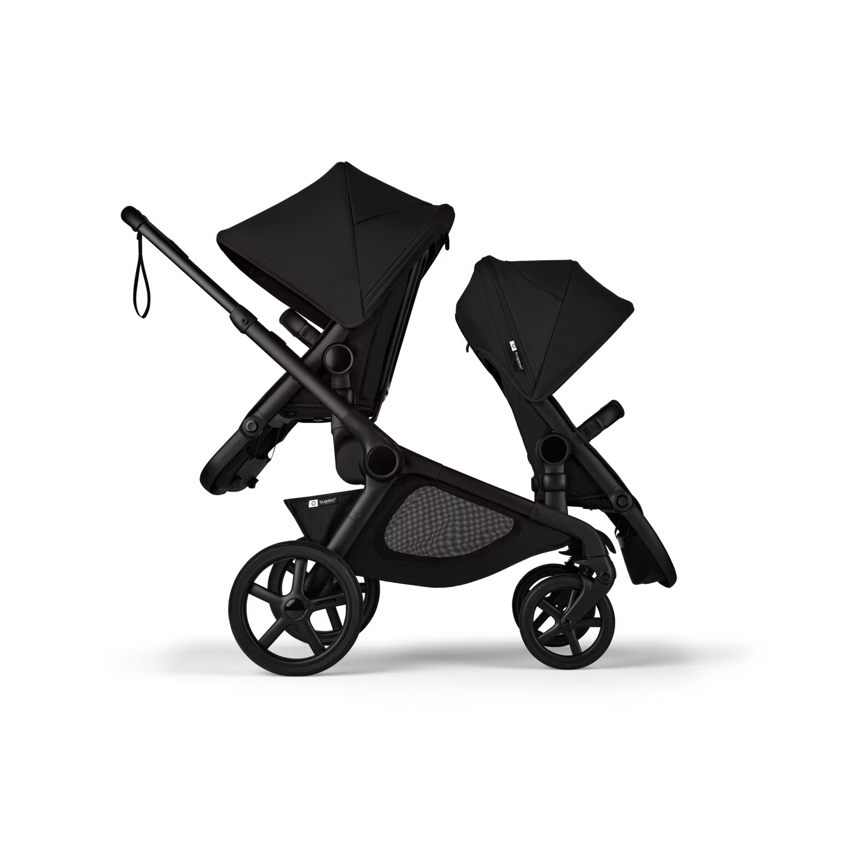 Side view of Bugaboo Kangaroo 2-in-1 tandem stroller with two seats, one facing parent and the other facing the world, with Midnight Black fabrics and Midnight Black sun canopies. - Main Modal Image Slide 4 of 18