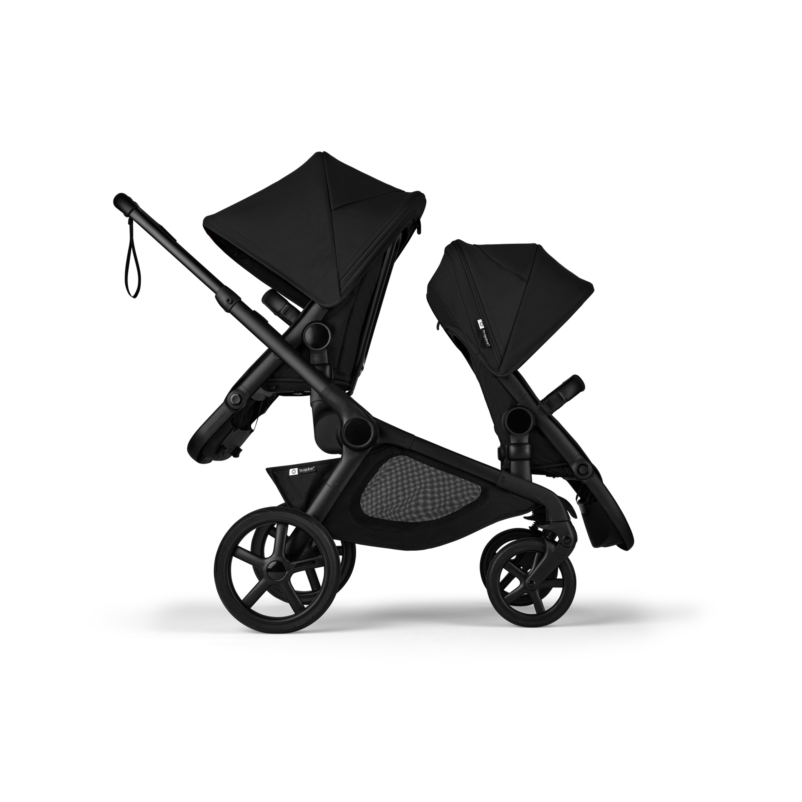 Side view of Bugaboo Kangaroo 2-in-1 tandem stroller with two seats, one facing parent and the other facing the world, with Midnight Black fabrics and Midnight Black sun canopies. - Thumbnail Slide 4 of 18