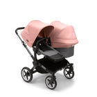 Bugaboo Donkey 5 Duo seat and bassinet stroller with graphite chassis, grey melange fabrics and morning pink sun canopy.