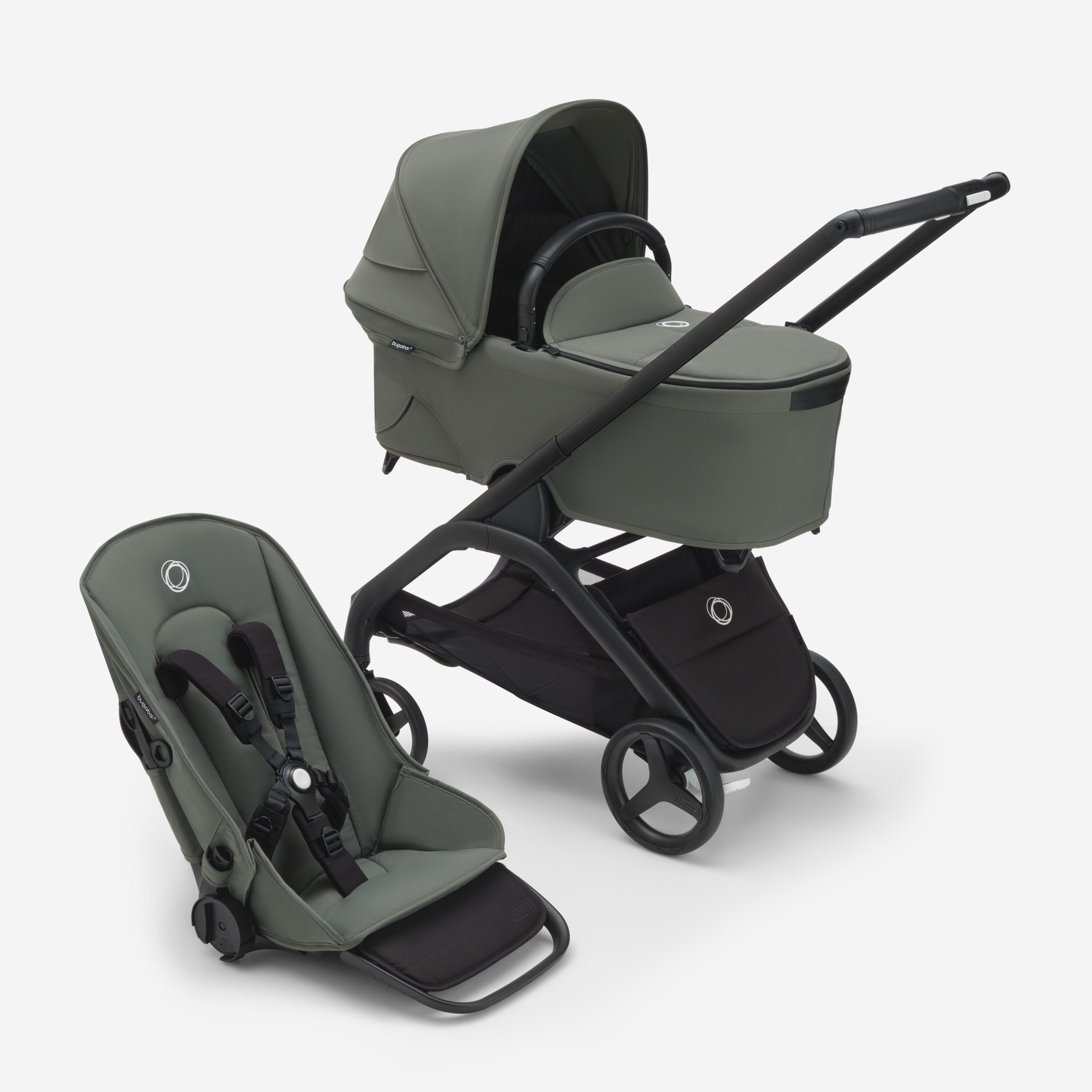 Bugaboo Dragonfly carrycot and seat pushchair with black chassis, forest green fabrics and forest green sun canopy. - Main Modal Image Slide 2 of 9