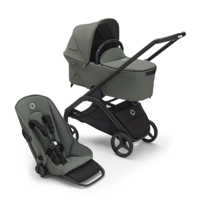 Bugaboo Dragonfly carrycot and seat pushchair with black chassis, forest green fabrics and forest green sun canopy.
