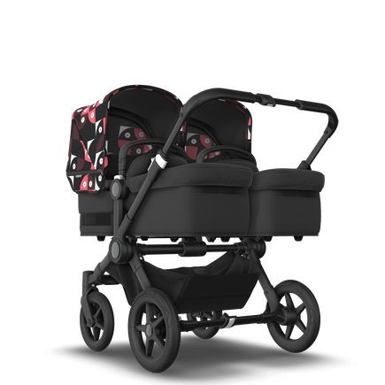 Bugaboo Donkey 5 Twin bassinet and seat stroller black base, midnight black fabrics, animal explorer pink/red sun canopy