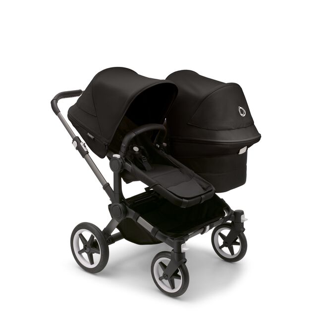 Bugaboo Donkey 5 Duo seat and bassinet stroller with graphite chassis, midnight black fabrics and midnight black sun canopy. - Main Image Slide 1 of 12