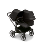 Bugaboo Donkey 5 Duo seat and bassinet stroller with graphite chassis, midnight black fabrics and midnight black sun canopy. - Thumbnail Slide 1 of 12