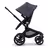 Side view of the Bugaboo Fox 5 seat pushchair with black chassis, midnight black fabrics and stormy blue sun canopy. - Thumbnail Slide 3 of 13