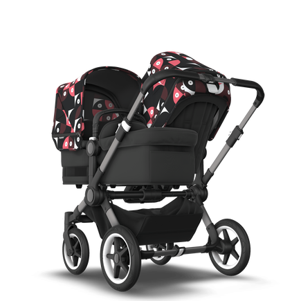 Bugaboo Donkey 5 Duo bassinet and seat stroller graphite base, midnight black fabrics, animal explorer pink/ red sun canopy - view 1