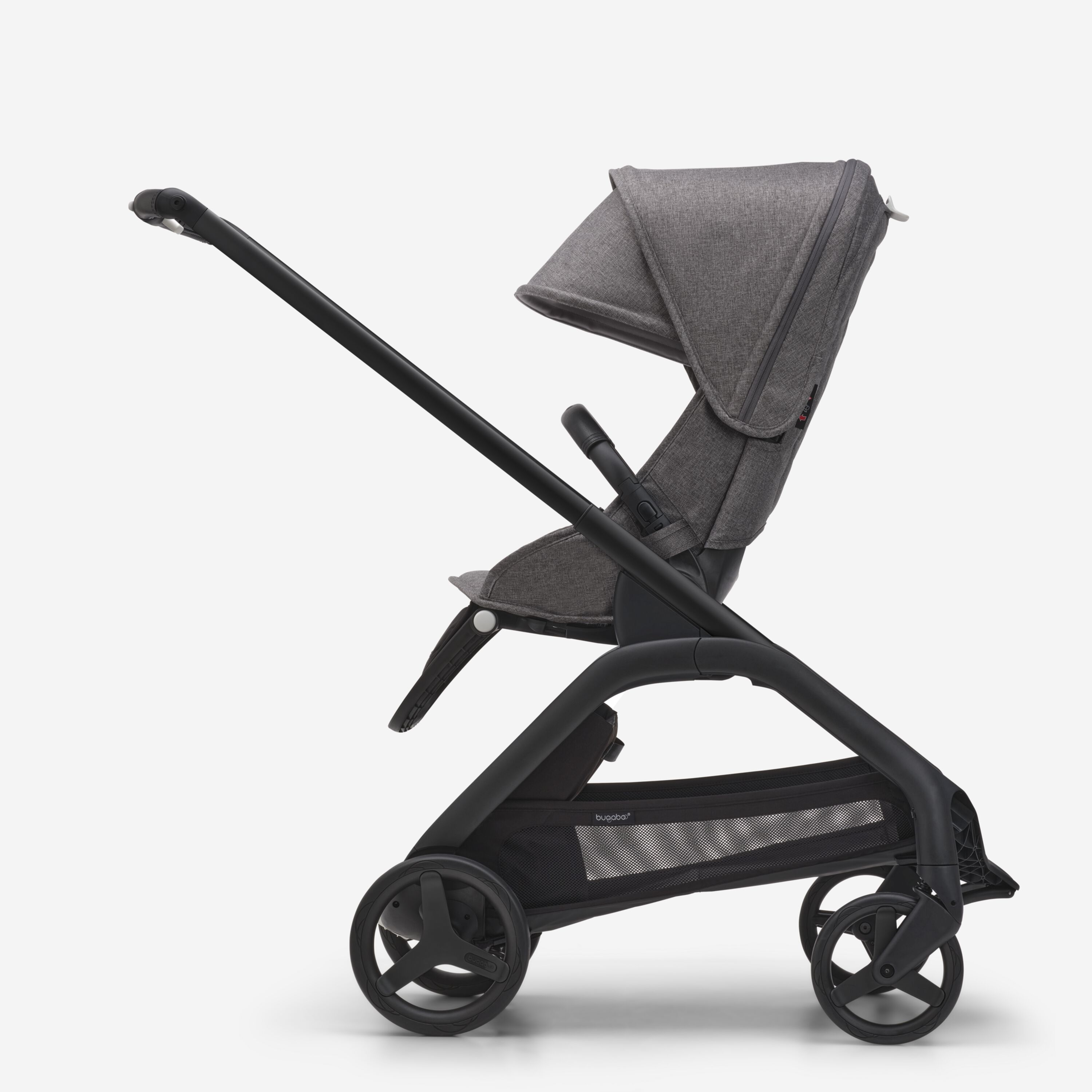 Vista laterale del passeggino con seduta Bugaboo Dragonfly con telaio black, tessuti grey melange e cappottina grey melange. - Main Modal Image Slide 2 of 16