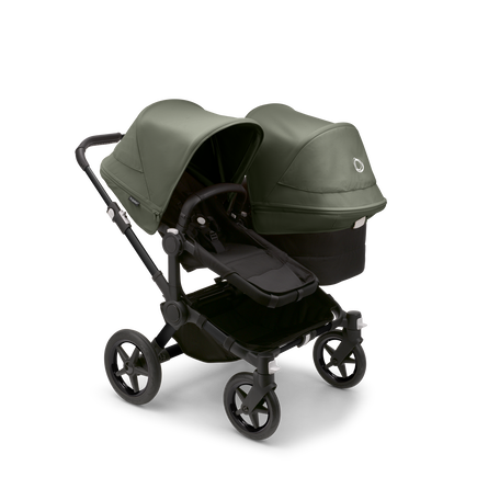 Bugaboo Donkey 5 Duo bassinet and seat stroller black base, midnight black fabrics, forest green sun canopy - view 1