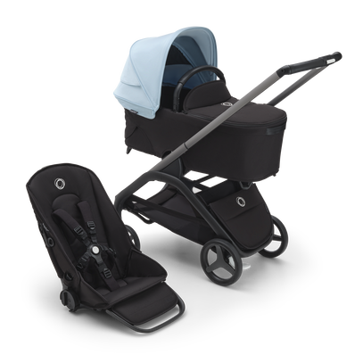 Bugaboo Dragonfly carrycot and seat pushchair with graphite chassis, midnight black fabrics and skyline blue sun canopy.