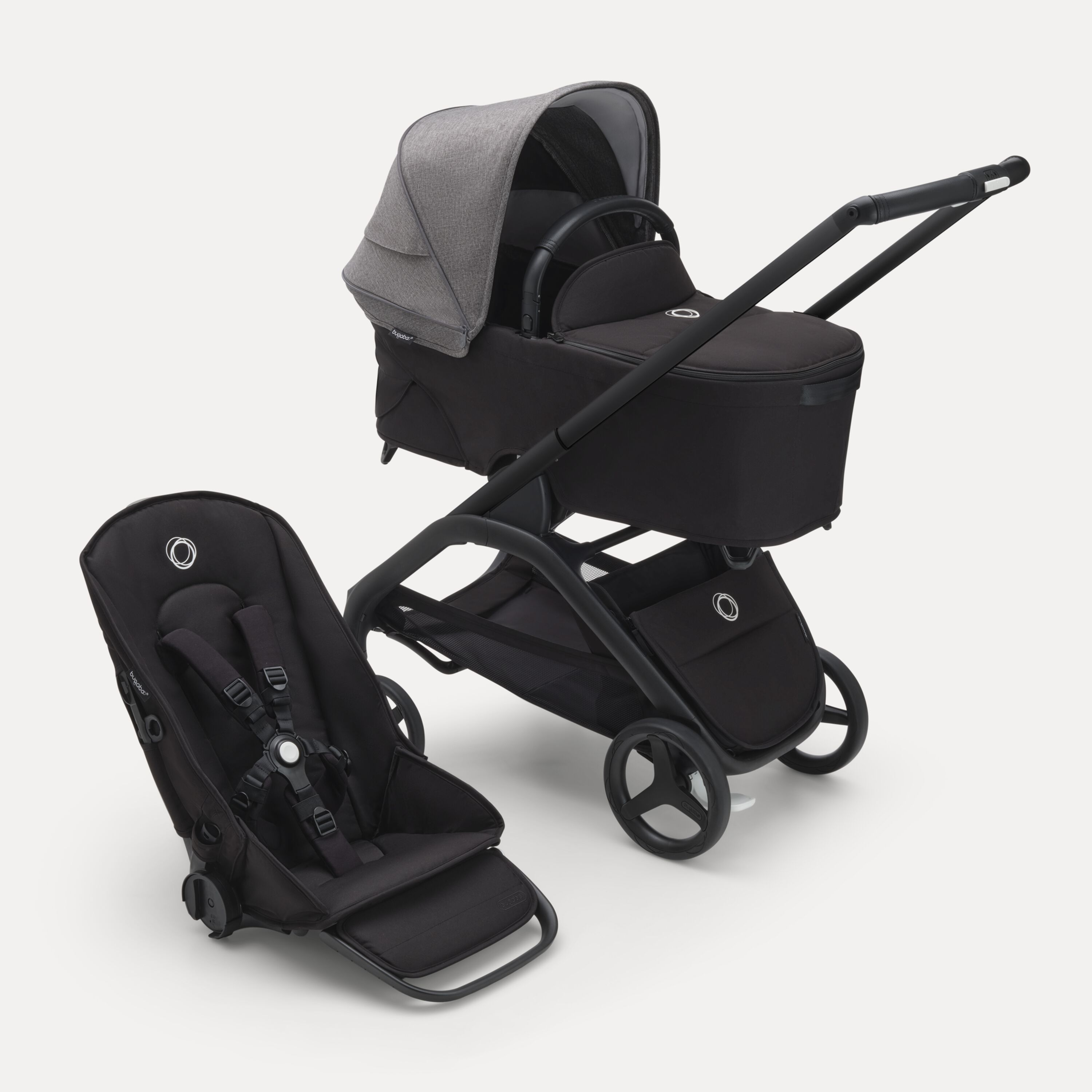 Bugaboo Dragonfly bassinet and seat stroller with black chassis, midnight black fabrics and grey melange sun canopy. - Main Modal Image Slide 1 of 16