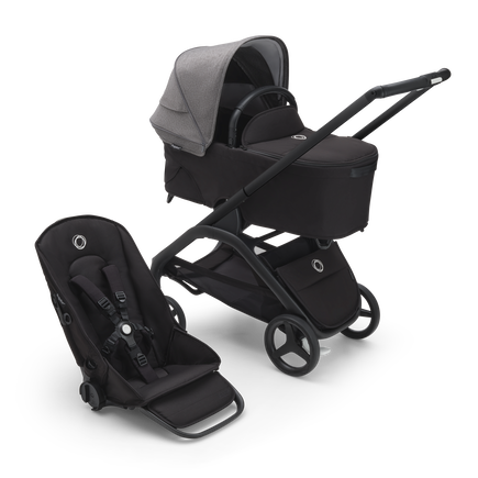 Bugaboo Dragonfly bassinet and seat stroller with black chassis, midnight black fabrics and grey melange sun canopy.