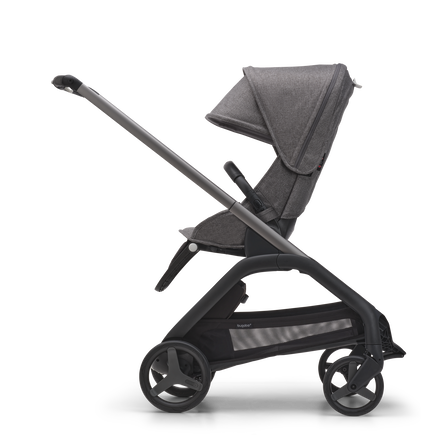 Side view of the Bugaboo Dragonfly seat stroller with graphite chassis, grey melange fabrics and grey melange sun canopy. - view 2