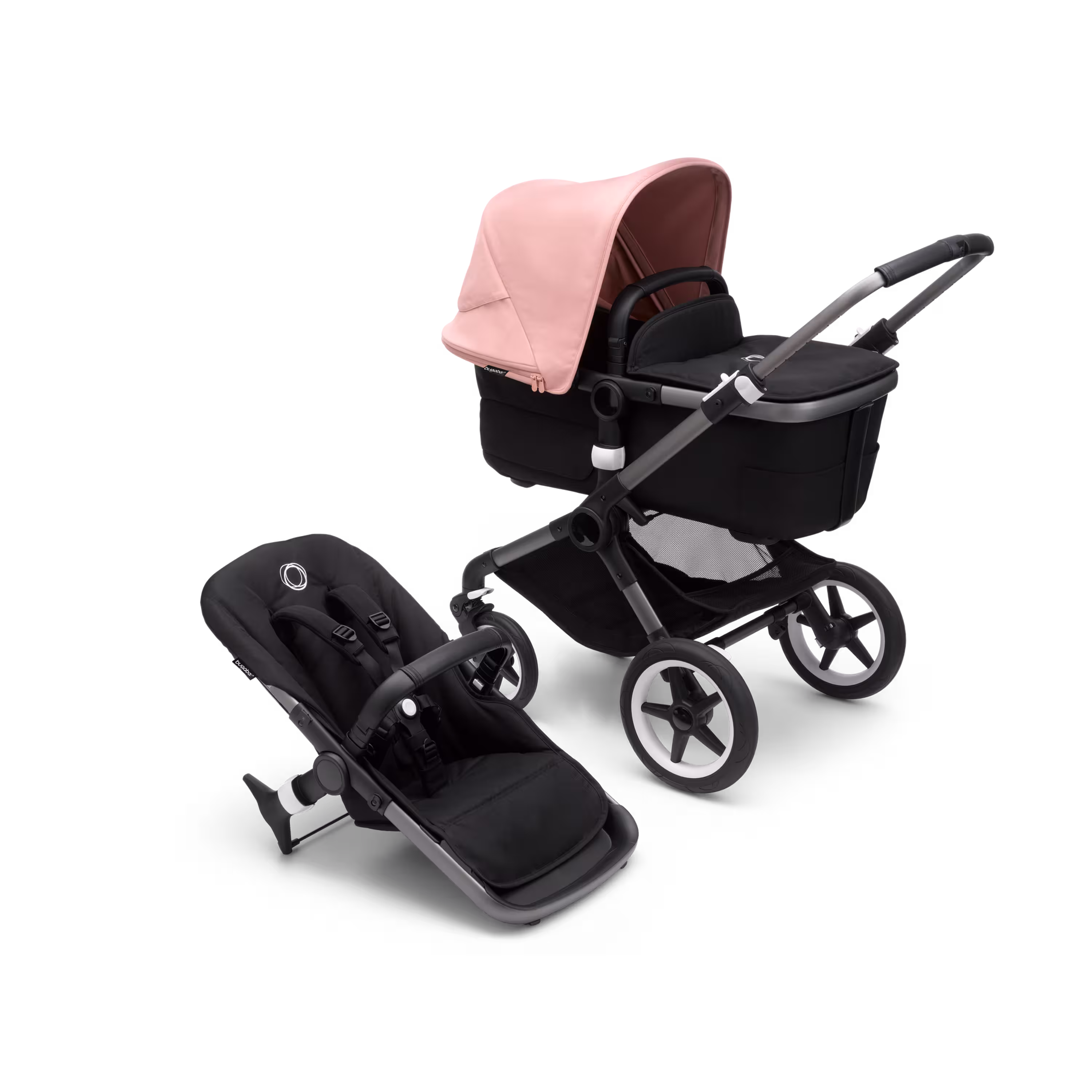 Bugaboo Fox 3 bassinet and seat stroller with graphite frame, black fabrics, and pink sun canopy. - Main Modal Image Slide 1 of 7