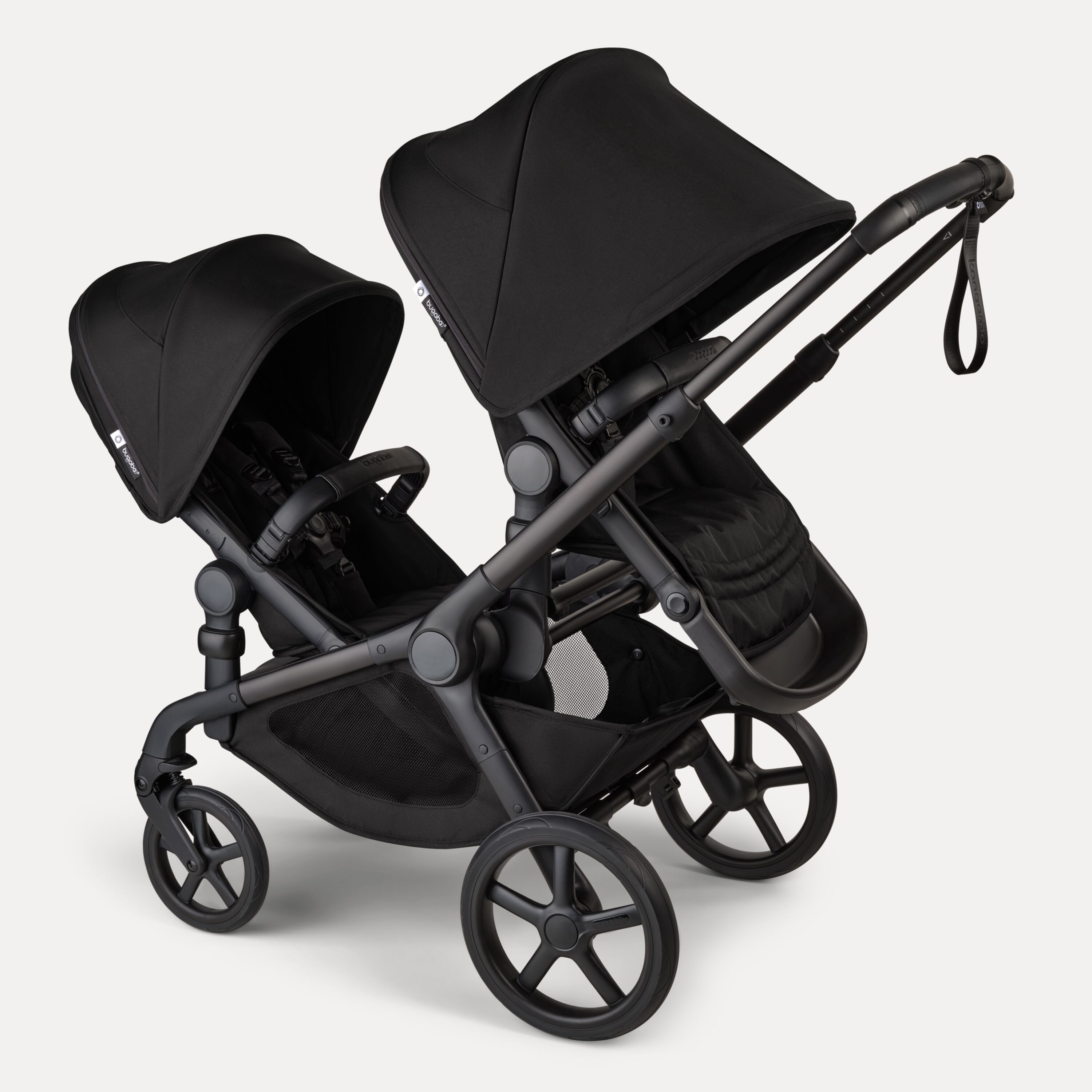Bugaboo Kangaroo 2-in-1 tandem stroller with two seats facing the parent, with Midnight Black fabrics and Midnight Black sun canopies. - Main Modal Image Slide 11 of 18