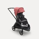 Poussette Bugaboo Dragonfly avec siège, châssis noir, housse gris chiné et capote rouge sunrise.